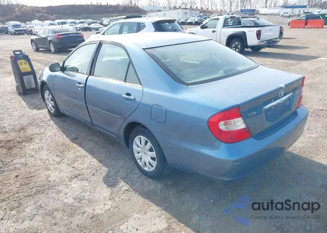 2002 Toyota Camry Le z USA, uszkodzony, nr VIN 4T1BE32K92U624428